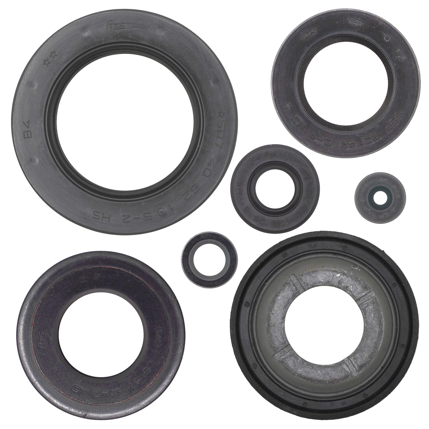 Set of various sizes of black rubber seals on a white background
